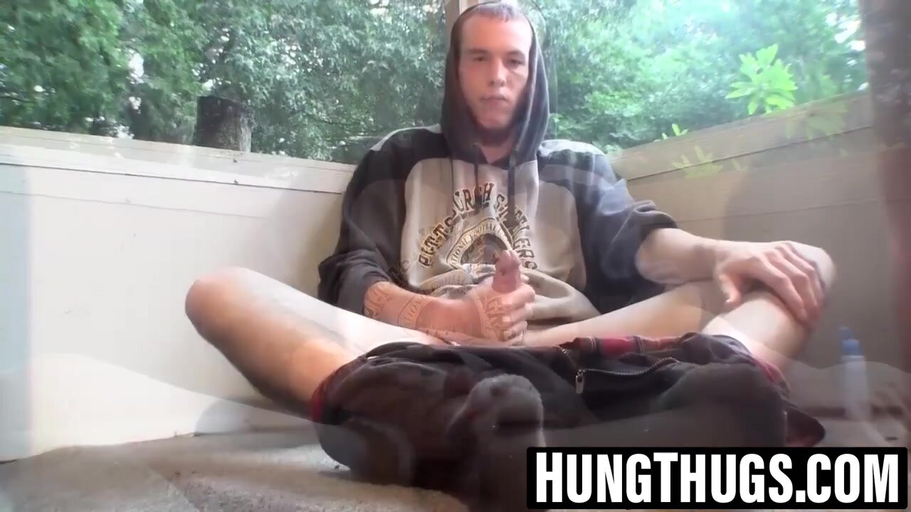 Teen smoker strokes and cums with cigar in mouth