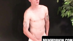 Gay hunk flaunts body and big penis while stroking